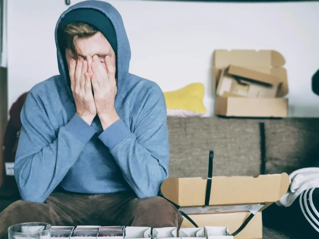 Depression man on couch christian erfurt sxQz2VfoFBE unsplash copy